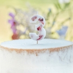 Picture of Pressed petal  number 3 birthday cake candle