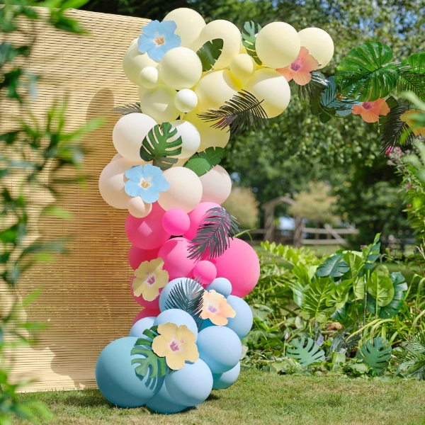 Picture of Blue, Pink, Green & Yellow Hawaiian Tiki Balloon Arch with Tropical Flowers and Foliage